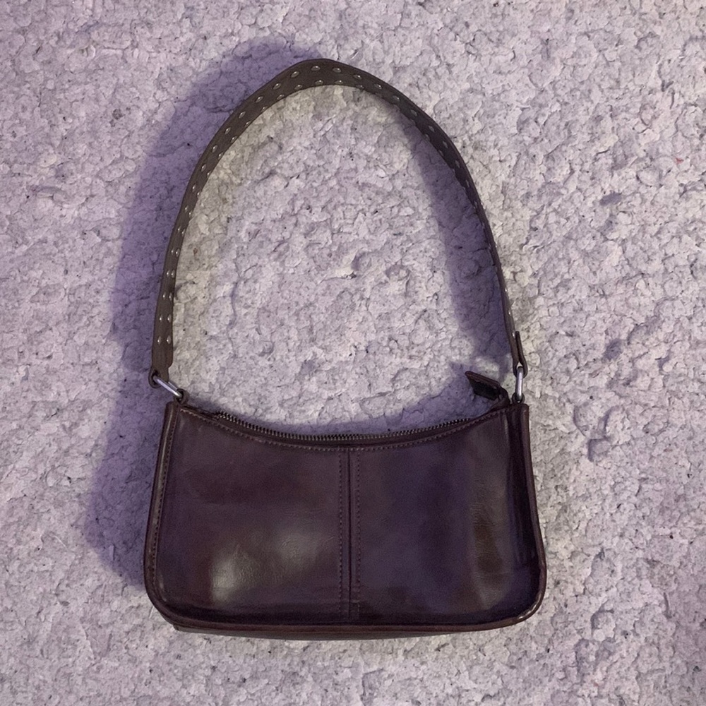 Brown brandy bag with the cute little plaid lining! Silver details and studs!